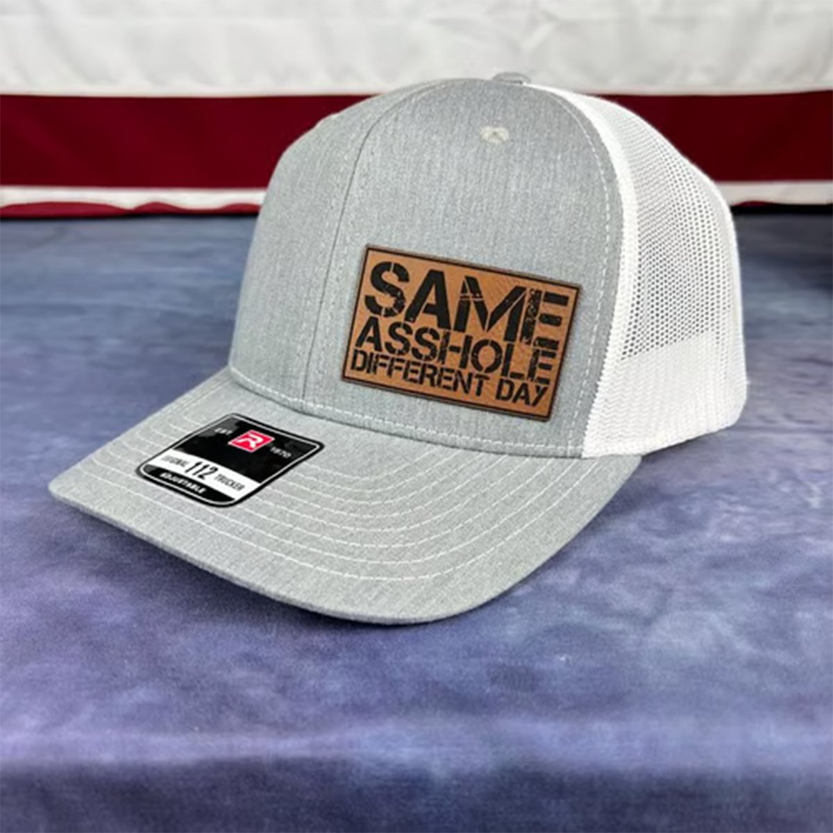 SAME ASSHOLE DIFFERENT DAY Hat
